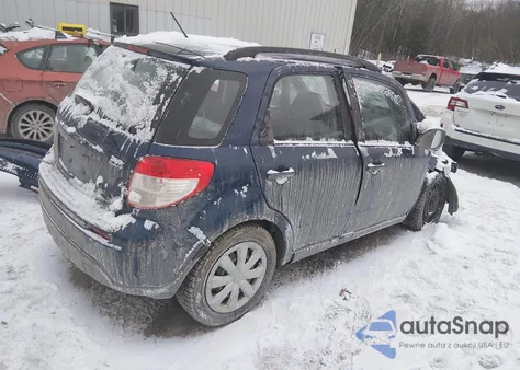2010 Suzuki Sx4 Technology z USA, uszkodzony, nr VIN JS2YB5A32A6311047